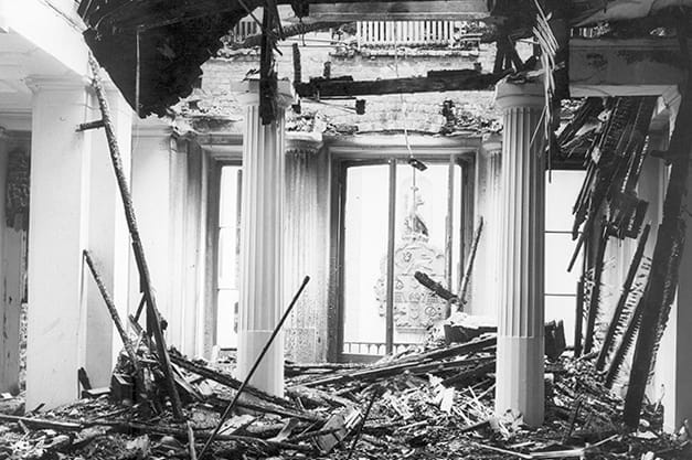 A photograph of the damage suffered by the college building during the war