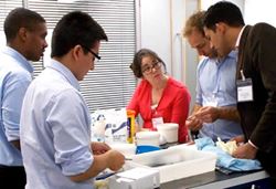 Student surgeons receiving advice