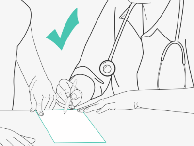 Surgeon holding pen on paper