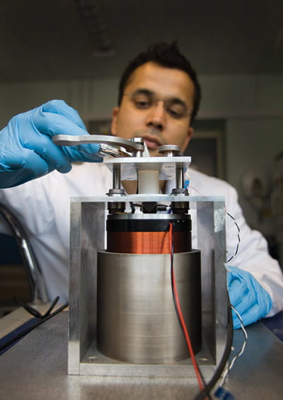 A student working on a piece of machinery