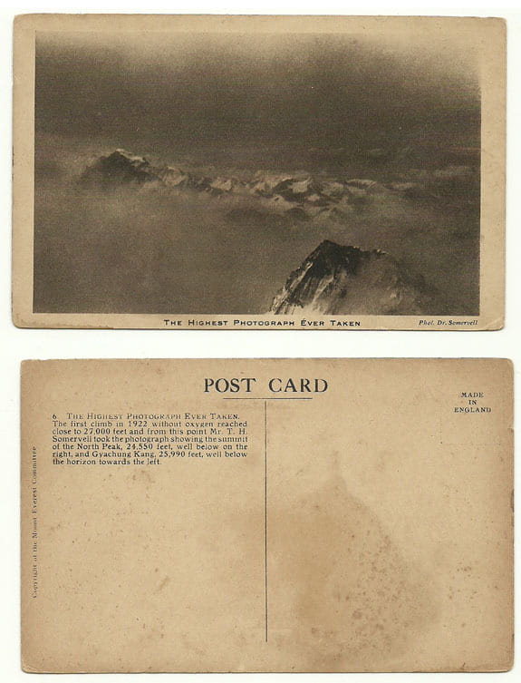 Front and back of a postcard showing a monochrome photograph looking down on mountain tops surrounded by clouds. Entitled: 'The highest photograph ever taken'.